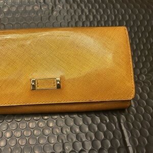 * Tumi Capra Honey Patent Zip Around Wallet